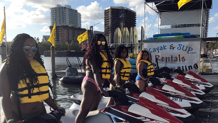 Family smiling before Jet Ski Rental in Miami